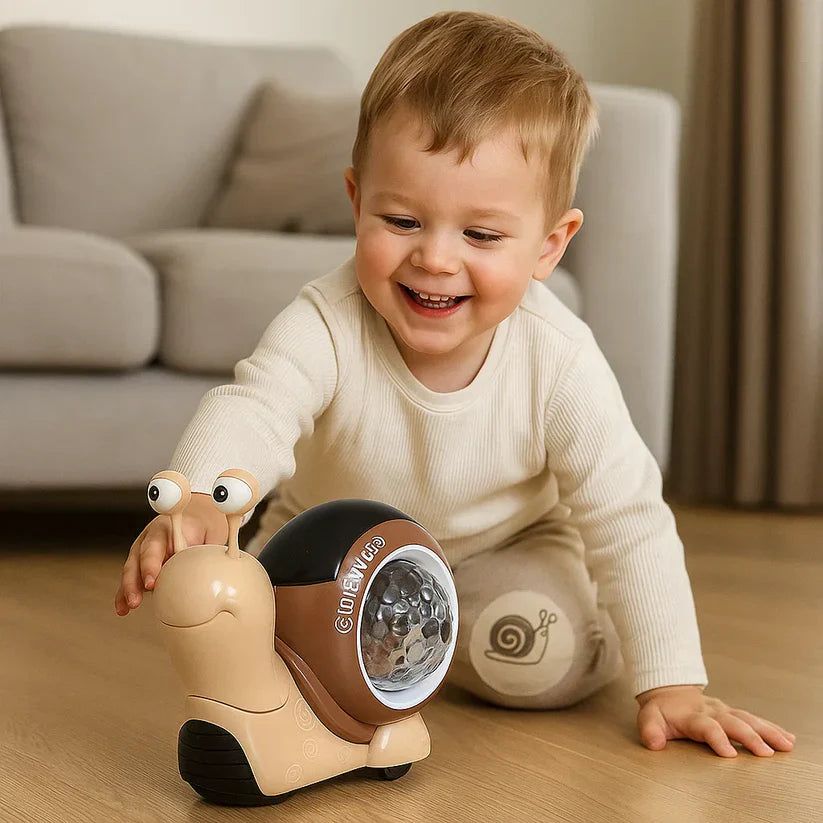 Helendav ja muusikat mängiv roomav tigu – arendav mänguasi